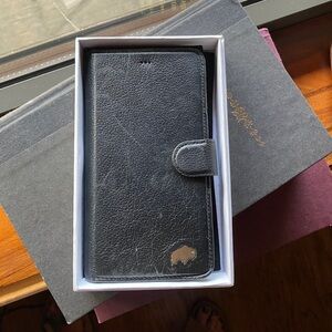 Burkley Leather Phone case- one in black and one in brown.